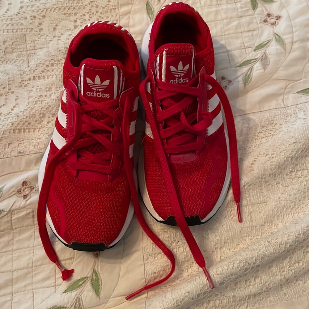 Red kids Adidas sneakers